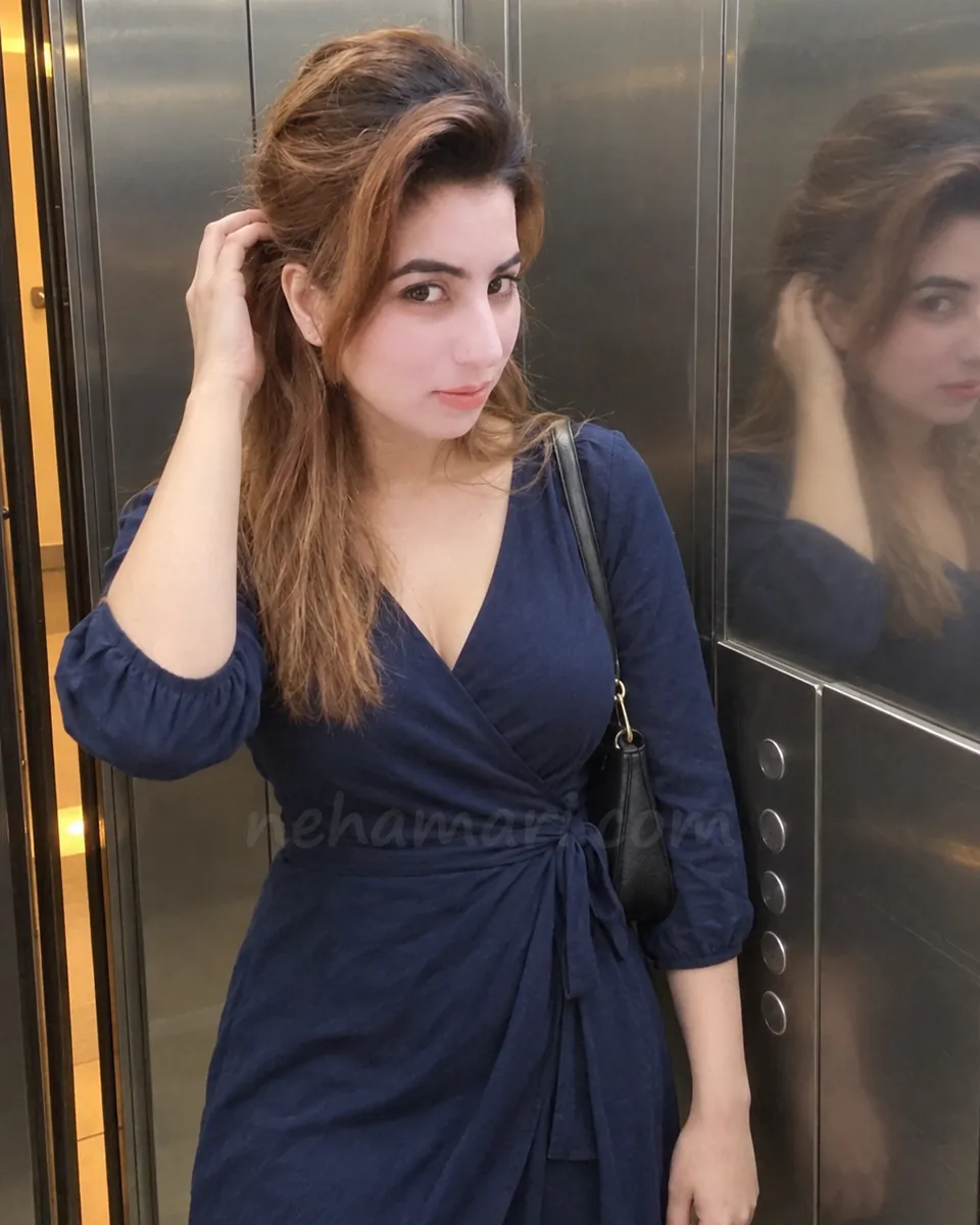 Manvi in a hotel lift in Bangalore on her way up to a booking made through Neha Mari